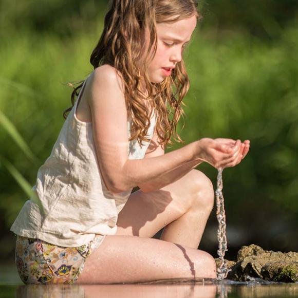 girl by the creek