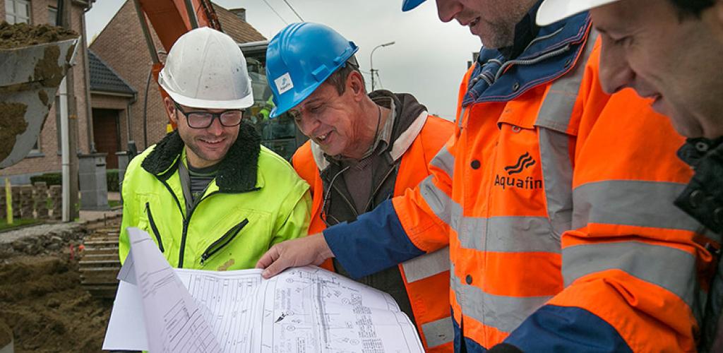 overleg plannen arbeiders